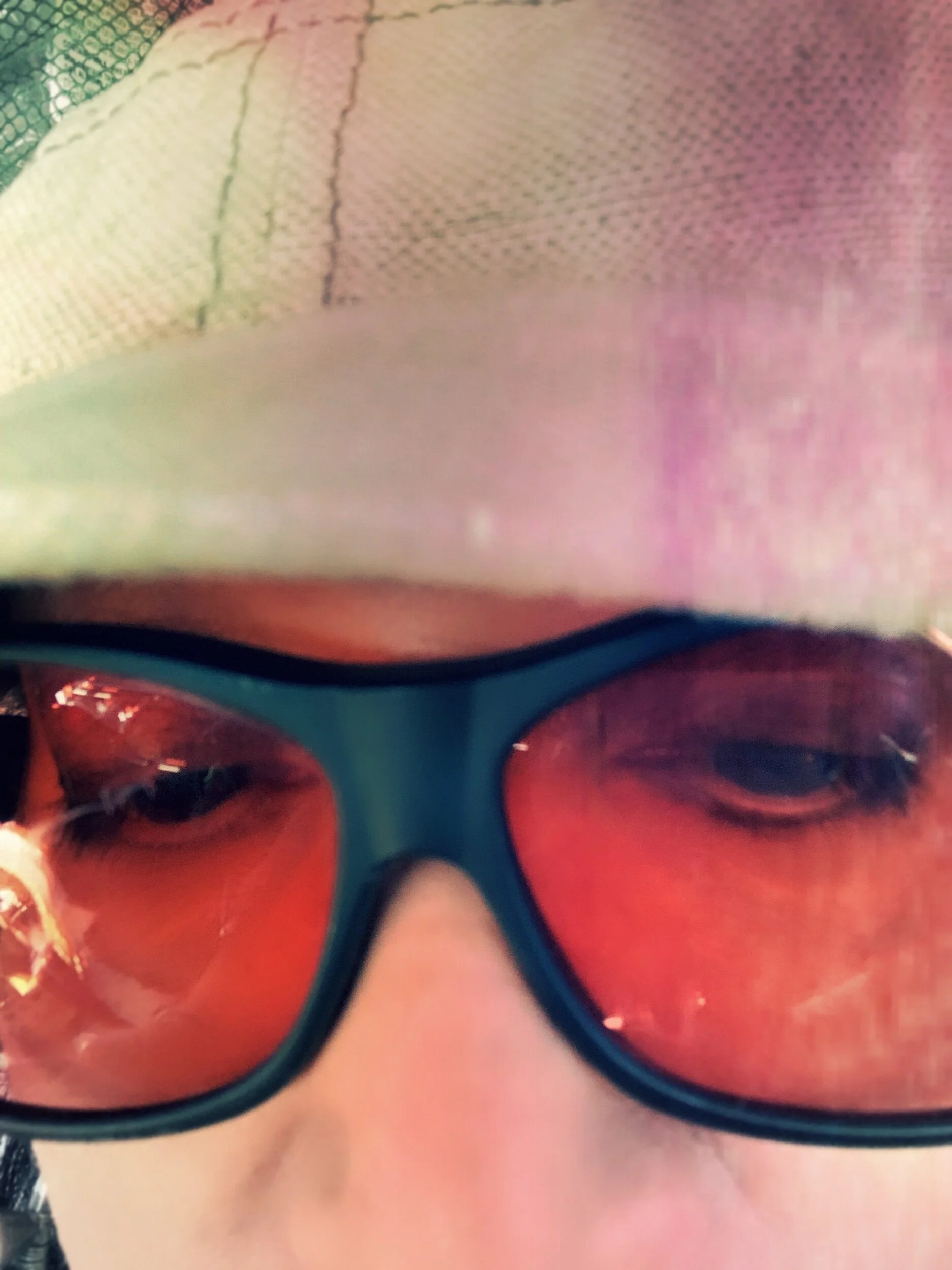 This was me today, feeling insane while driving and getting a migraine. Hard to explain if you don’t get migraines with auras. Colors and disorientation. I couldn’t get my hat down low enough and couldn’t find my migraine shades for the first 5 minutes of the onset. Pulled over and found them and took this.